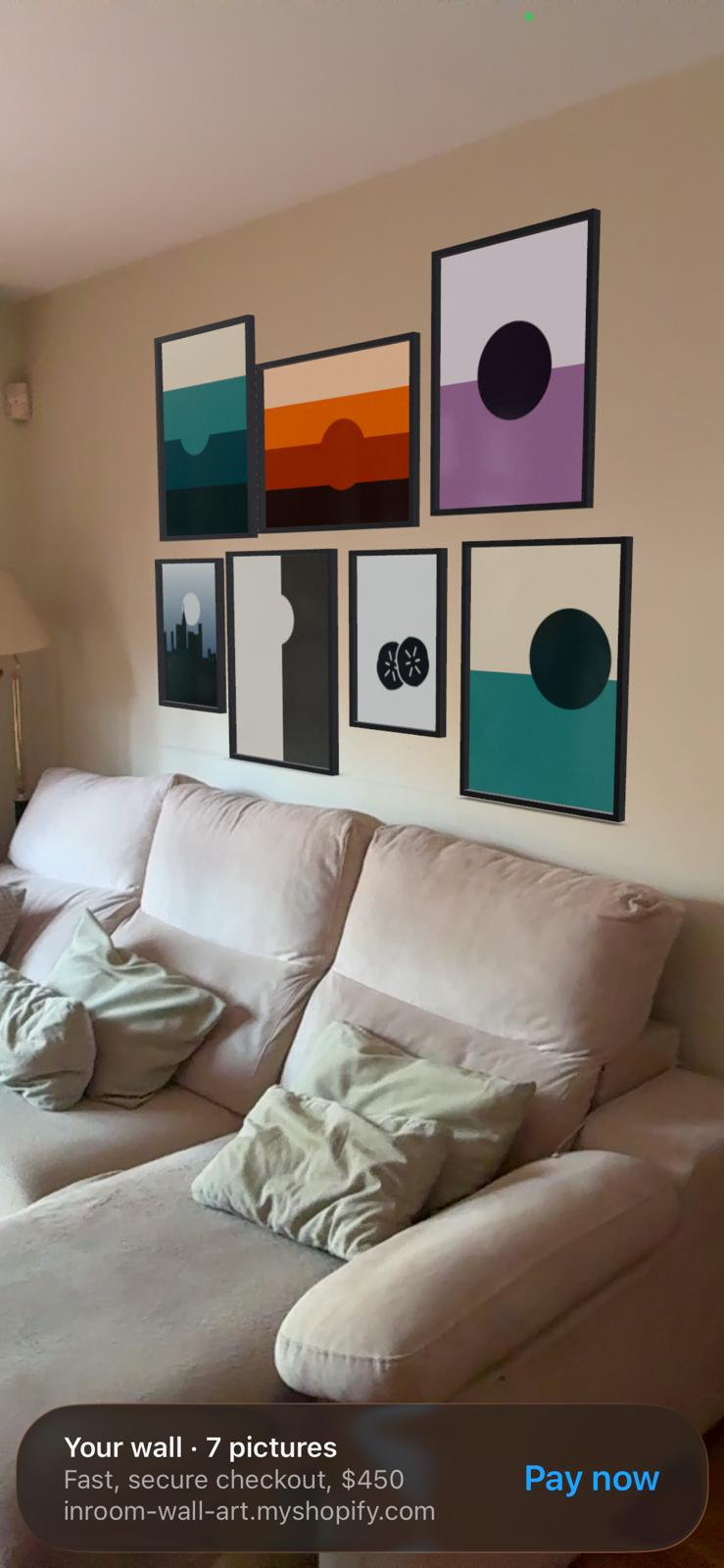 Seven pieces hung in AR on a real wall, with the Apple Quick Look payment banner
